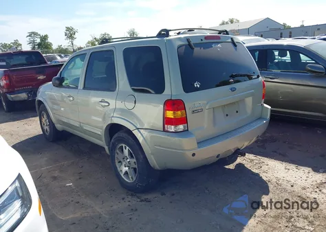 2003 Ford Escape Limited z USA, uszkodzony, nr VIN 1FMCU94103KE14781